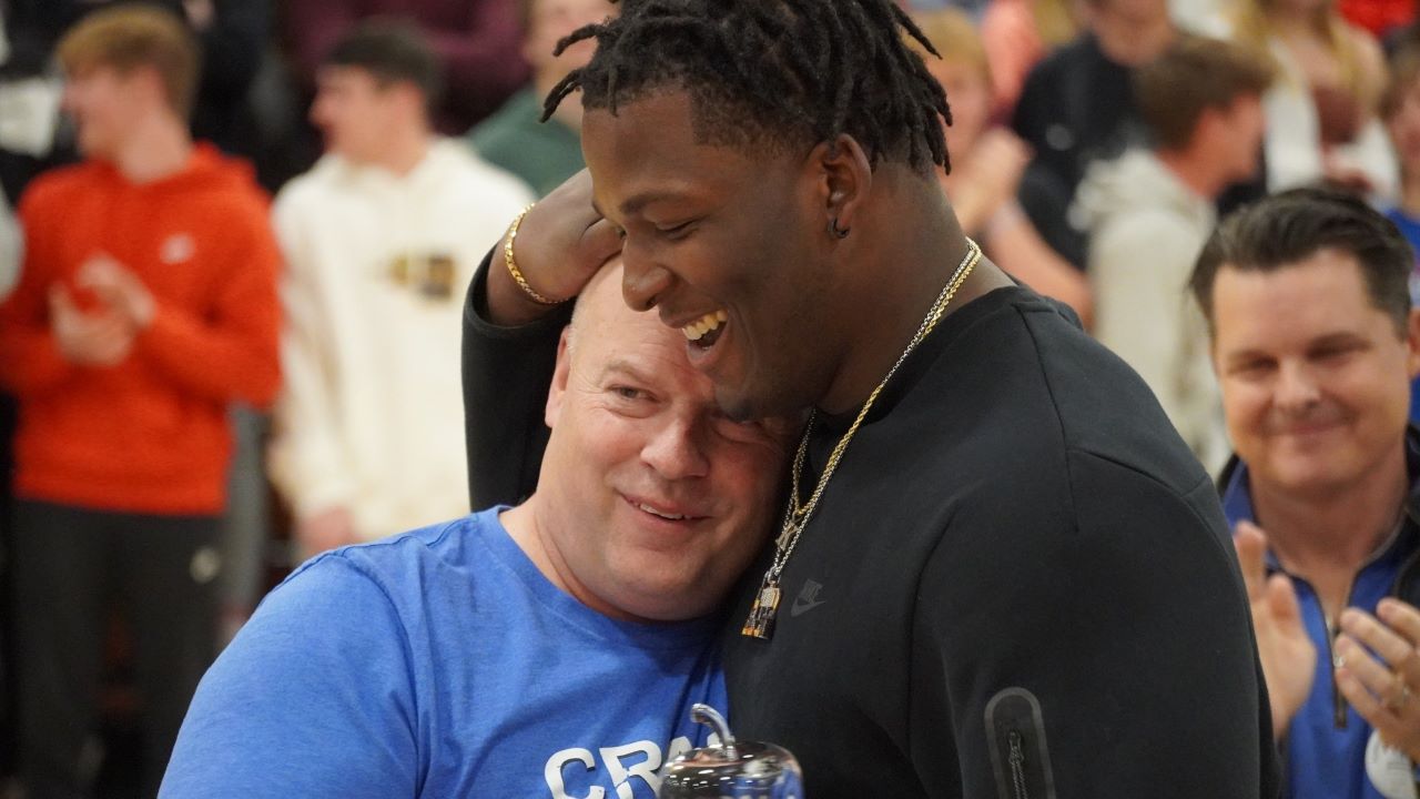 Mark Mullen and Keeanu Benton share a moment during an assembly last week at Craig High School. School District of Janesville photo