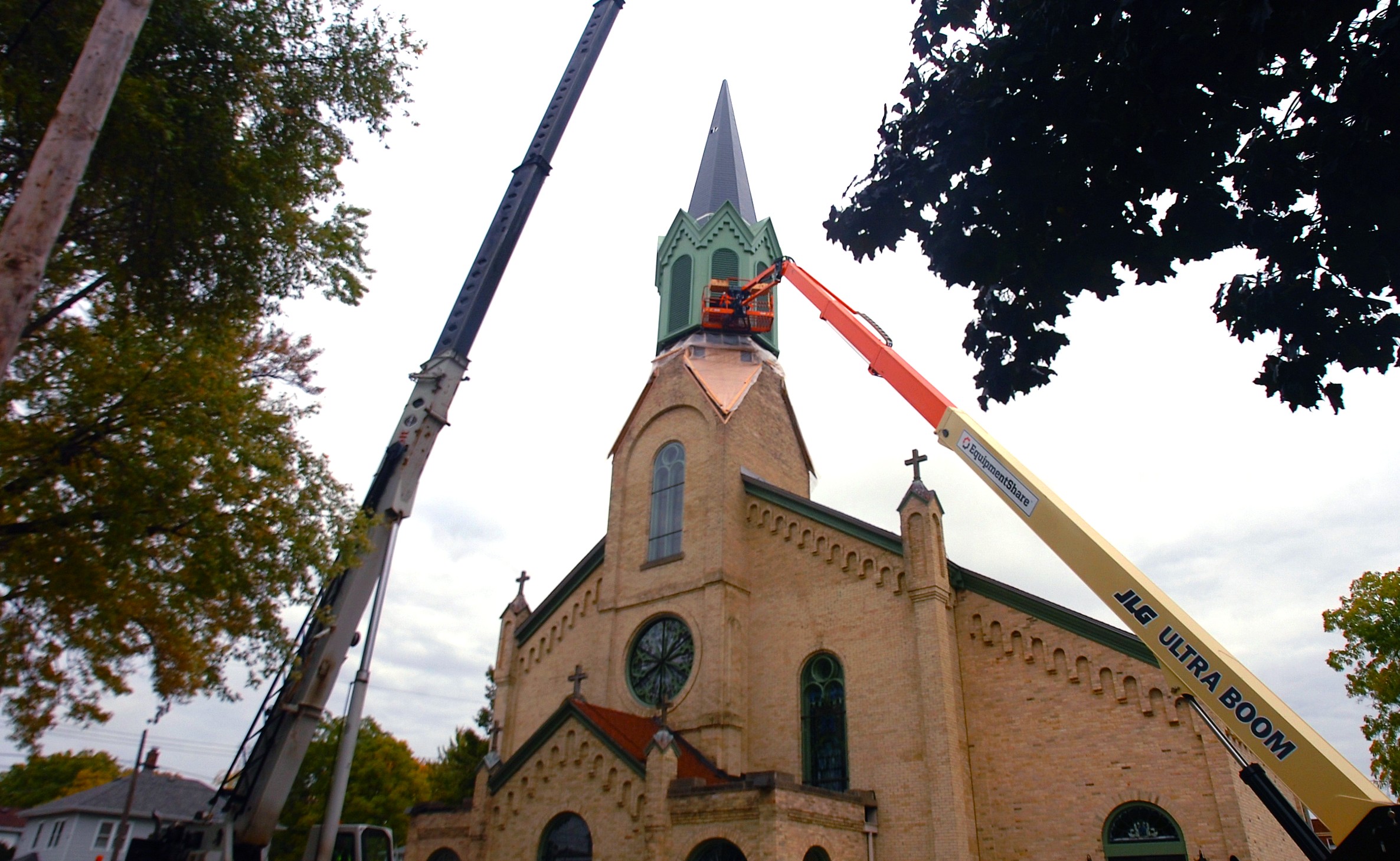 A new steeple was lifted in place over St. Patrick's Church in Janesville. JNR photo by Dan Plutchak