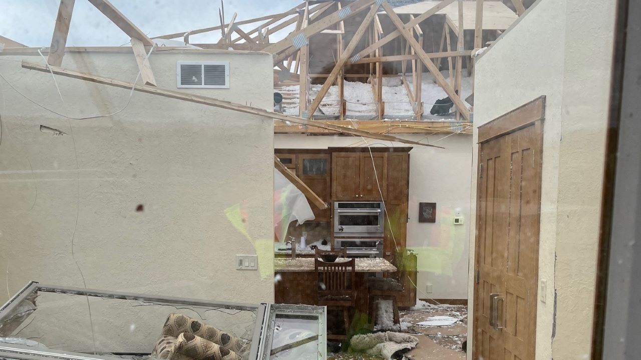 Property owners spend a second day Saturday working to recover from a powerful tornado that raced through parts of Rock County Thursday evening. National Weather Service photo.