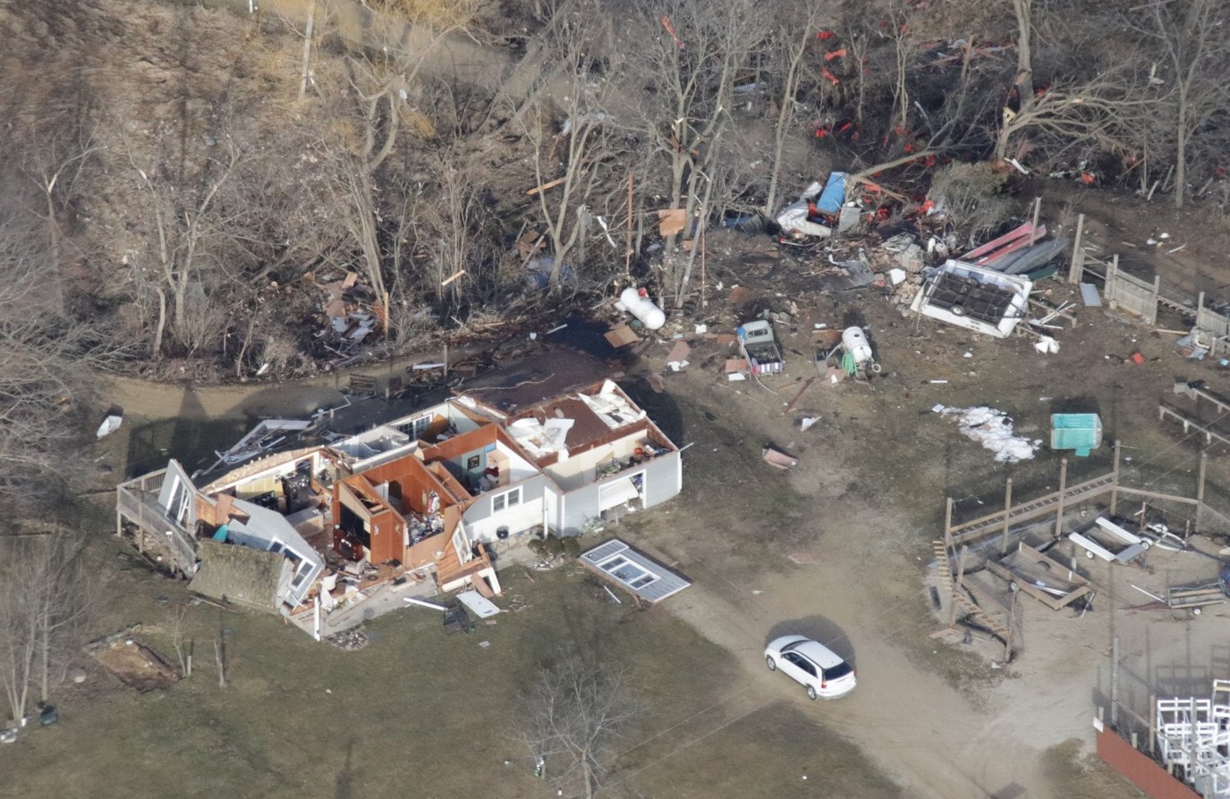 Photographs from the ground and the air revealed the devastation of from a tornado that tore through Green and Rock counties.