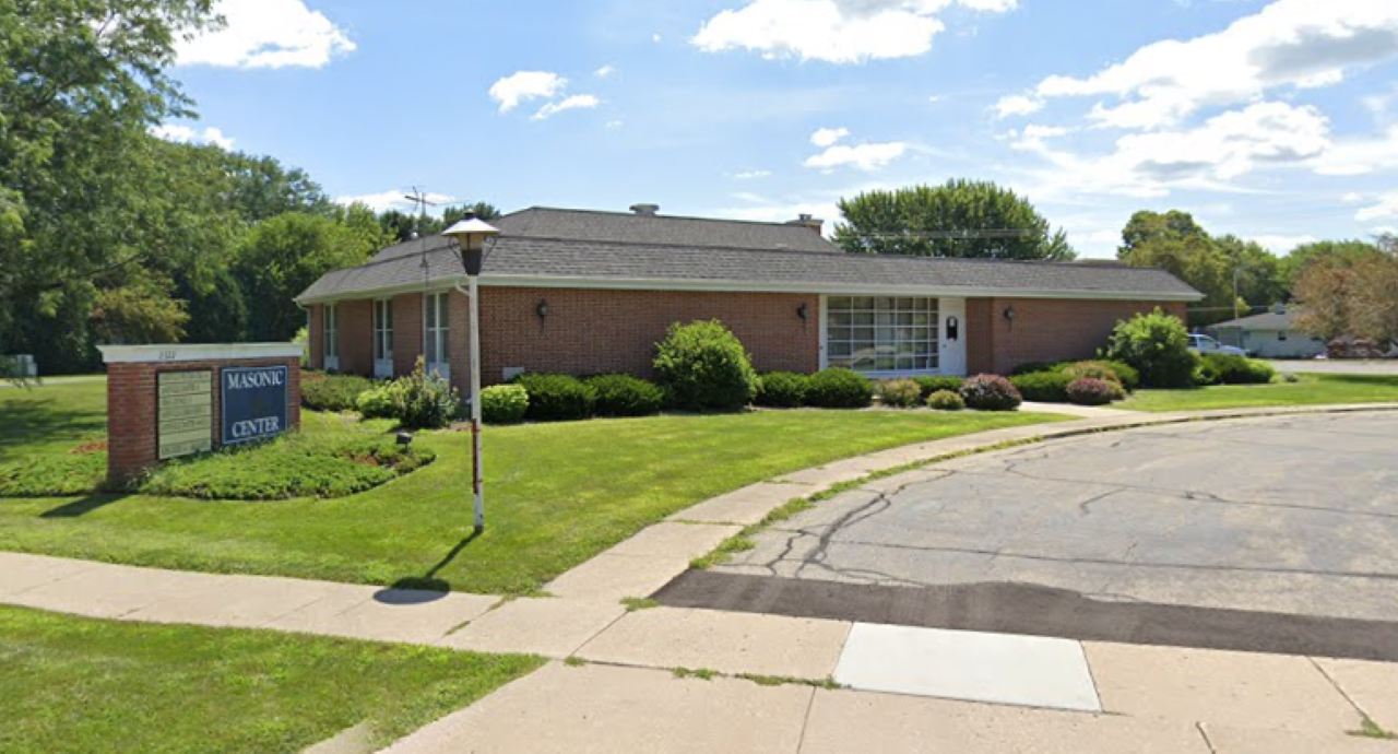 Janesville police are investigating after someone fired multiple shots through the window of the Masonic Center on the city's east side.